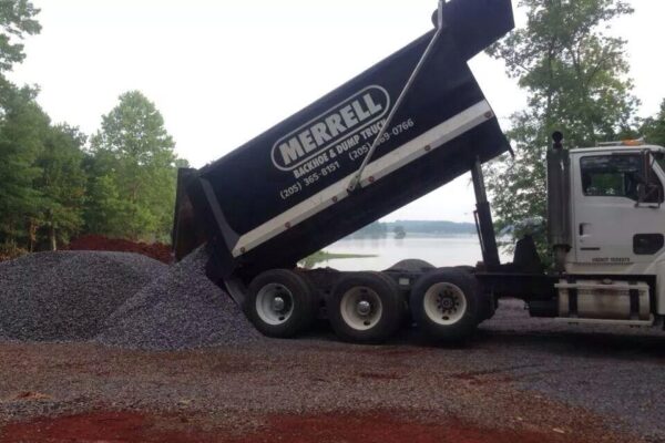 dump truck delivering gravel
